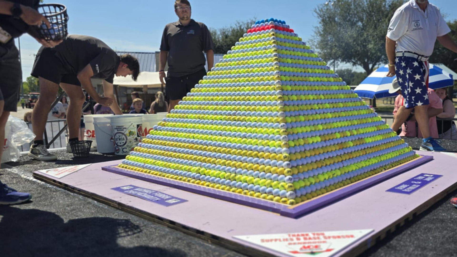 Benbrook community builds record-breaking golf ball pyramid at Heritage Fest