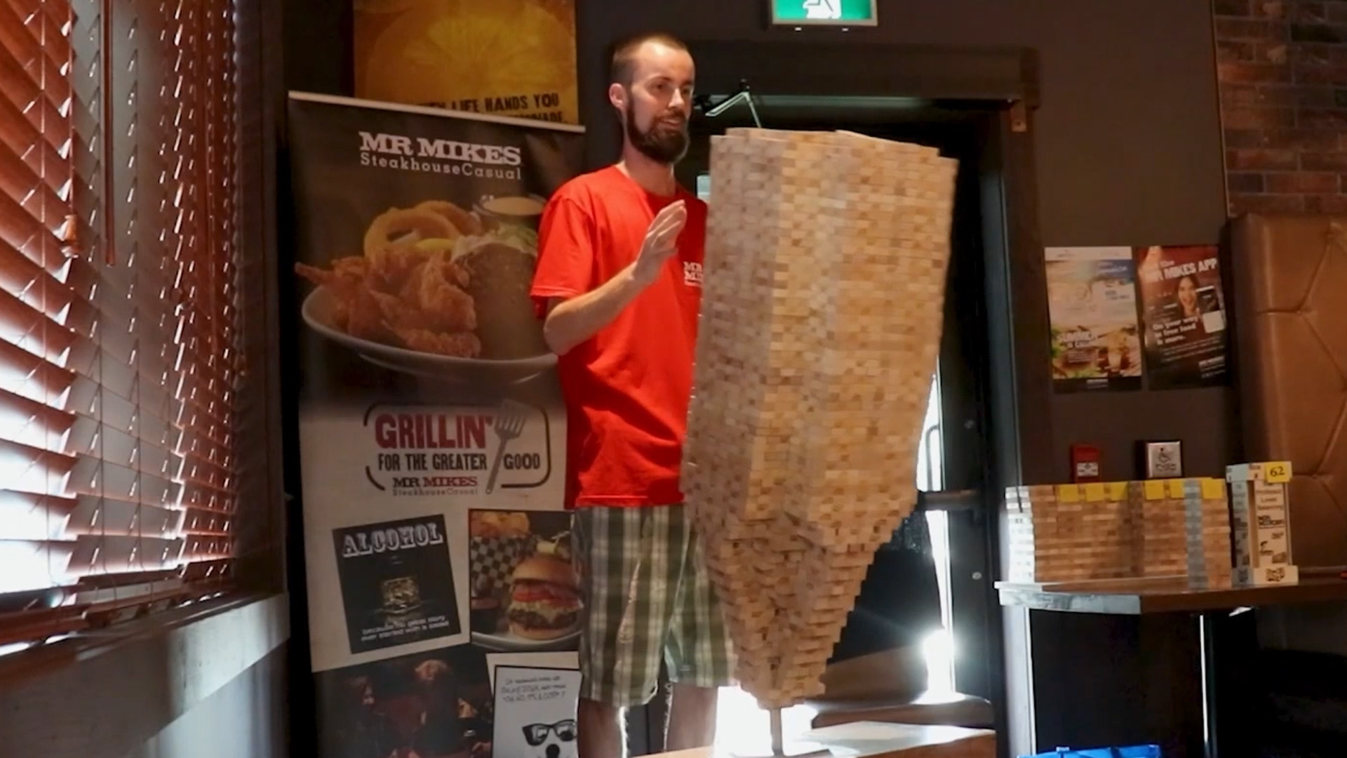 Canadian man breaks world record by stacking 3,132 Jenga blocks on a single piece