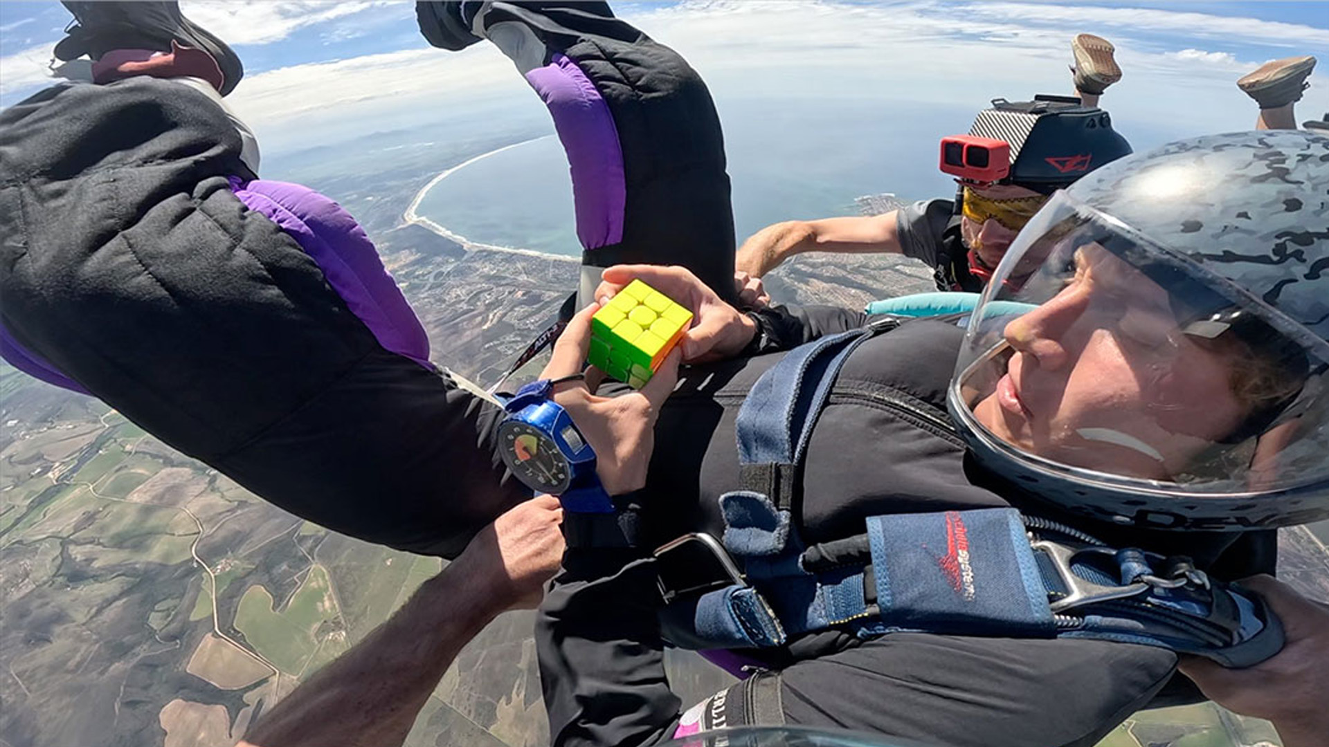 Solving a Rubik's Cube while skydiving at 100 mph